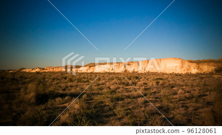 Panorama view to Plateau Ustyurt from the edge of Aral sea near Aktumsuk cape at sunrise, Karakalpakstan, Uzbekistan Panorama view to Plateau Ustyurt from the edge of Aral sea near Aktumsuk cape at sunrise, Karakalpakstan, Uzbekistan 96128061