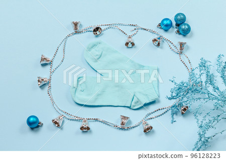 Pair of women socks on blue background. Pair of women socks on blue background. 96128223