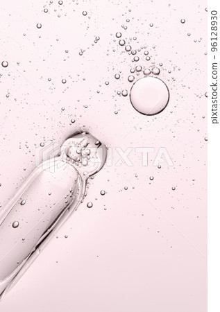 The texture of a cosmetic serum with a pipette closeup. Copy space The texture of a cosmetic serum with a pipette closeup. Copy space 96128930
