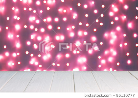 Abstract background, mockup. Defocused pink lights bokeh and white wooden surface 96130777