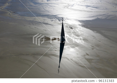 Aerial apocalyptic scene, silhouette of church tower with cross buried under mud and toxic copper mining residuals 96131383