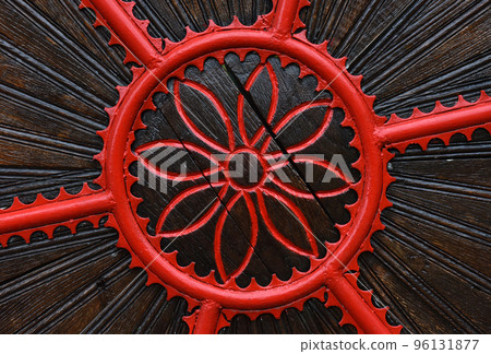 Detail of a red forged metallic gate Detail of a red forged metallic gate 96131877