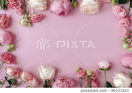 Peonies, roses on pink background with copy space. Abstract natural floral frame layout with text space. Romantic feminine composition. Wedding invitation. International Women day, Mother Day concept 96131883