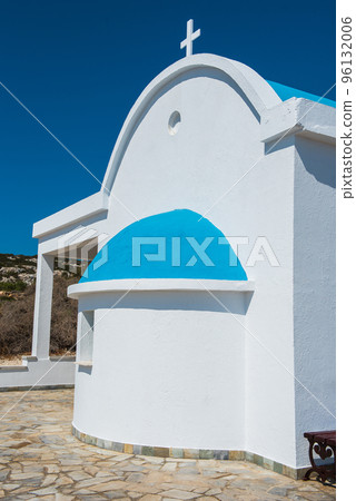 Traditional white chapel with a blue roof on the seaside. Agioi Anargyroi, Cyprus Traditional white chapel with a blue roof on the seaside. Agioi Anargyroi, Cyprus 96132006