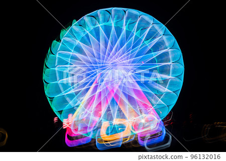 Blurred giant wheel, ferris at night Blurred giant wheel, ferris at night 96132016