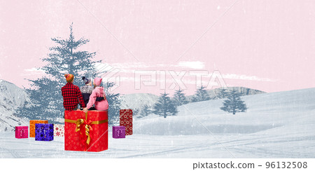Contemporary art collage. Young people sitting on present box in winter forest. Love and friendship Contemporary art collage. Young people sitting on present box in winter forest. Love and friendship 96132508
