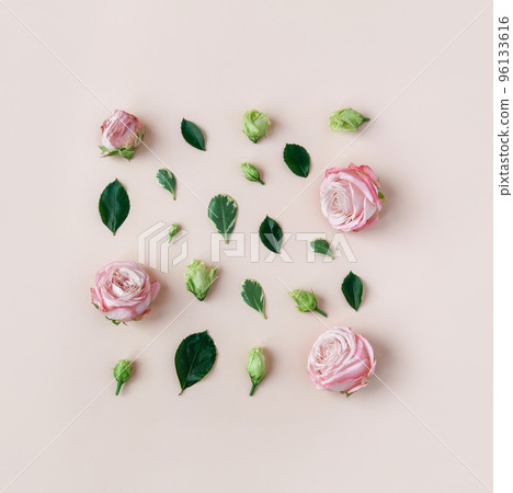 Natural square floral layout with copy space made. Flowers and leaves on trendy pastel beige background. Roses and small buds making abstract composition with space for design. Easter, spring concept Natural square floral layout with copy space made. Flowers and leaves on trendy pastel beige background. Roses and small buds making abstract composition with space for design. Easter, spring concept 96133616