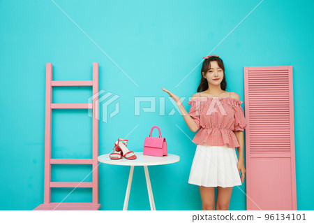 Colorful portrait of a young woman 96134101