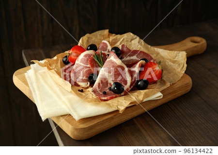 Concept of delicious Spanish cuisine - jamon meat Concept of delicious Spanish cuisine - jamon meat 96134422