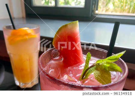 Cool cocktails in a cafe on a hot summer day. Background drinks. 96134918
