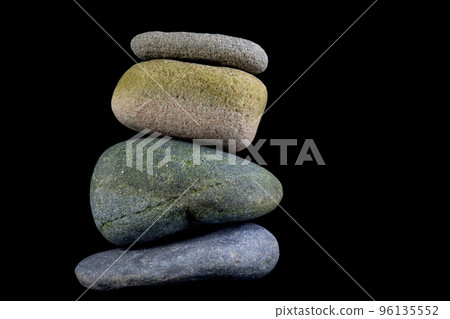 Pile of Pebbles Isolated on a Black Background Pile of Pebbles Isolated on a Black Background 96135552