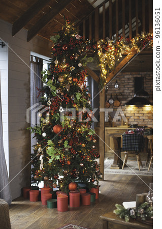 Christmas tree in the chalet. New Year interior. Christmas tree in the chalet. New Year interior. 96136051