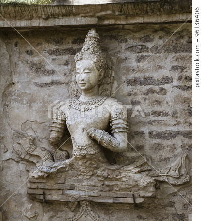 Wat Jed Yod, built in 1497, is a large active temple where monks live and study, and is seldom Wat Jed Yod, built in 1497, is a large active temple where monks live and study, and is seldom 96136406