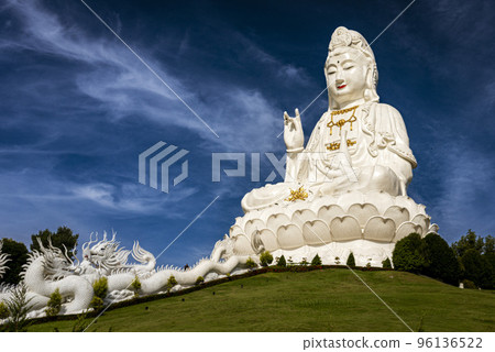 The immense white female Buddha at the Temple of Mercy (Guanyin) in Chiang Mai is easily The immense white female Buddha at the Temple of Mercy (Guanyin) in Chiang Mai is easily 96136522
