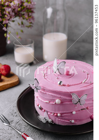 pink cake decoration in the form of butterflies 96137453