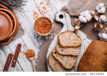 Fresh slice bread on wood top view Fresh slice bread on wood top view 96138403