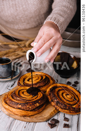 sweet chocolate cinnamon rolls on wood sweet chocolate cinnamon rolls on wood 96138436