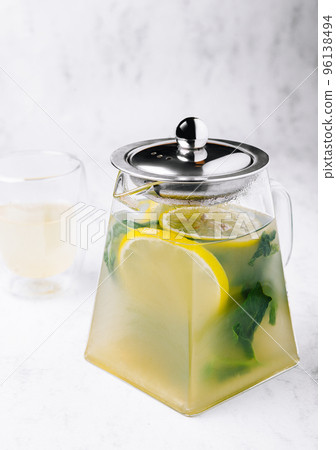 Tasty cold ice tea on table 96138494