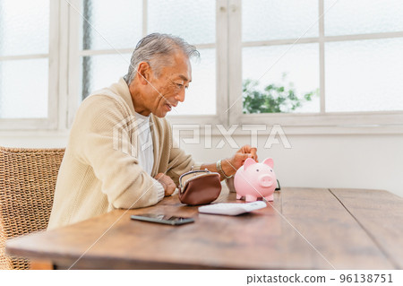 Savings savings piggy bank pig piggy bank person male Savings savings piggy bank pig piggy bank person male 96138751
