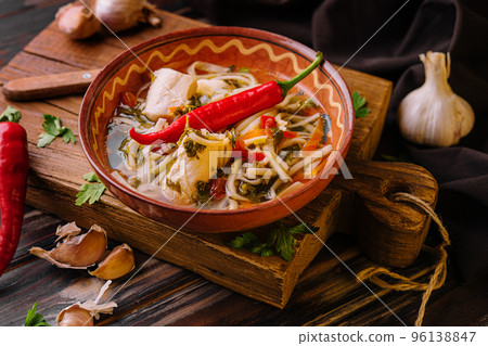 Soup with Chicken Broth with Noodles and Vegetables Soup with Chicken Broth with Noodles and Vegetables 96138847