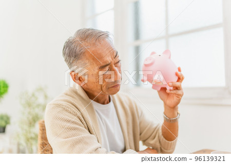 Savings savings piggy bank pig piggy bank person male Savings savings piggy bank pig piggy bank person male 96139321