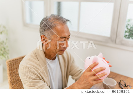 Savings savings piggy bank pig piggy bank person male Savings savings piggy bank pig piggy bank person male 96139361