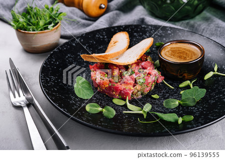 Raw beef tartar snack with capers Raw beef tartar snack with capers 96139555