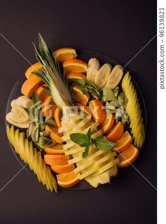 Fresh fruit platter on a plate Fresh fruit platter on a plate 96139821