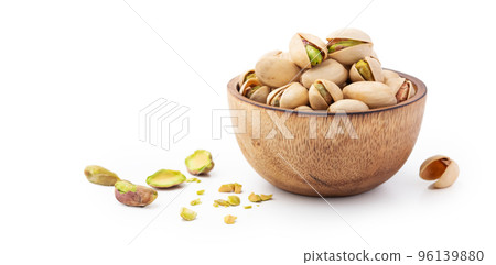 Pistachio in wood bowl on white background with copy space 96139880