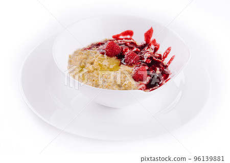 Oatmeal rustic porridge with raspberries jam 96139881