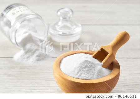 sodium bicarbonate on a white wooden table, close-up. 96140531