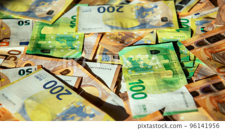 Euro cash banknotes of different denominations close-up texture Euro cash banknotes of different denominations close-up texture 96141956