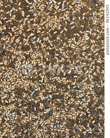 Background of many used pistol bullet shells 96142005