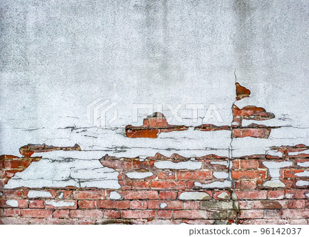 old peeling wall with exposed brick 96142037