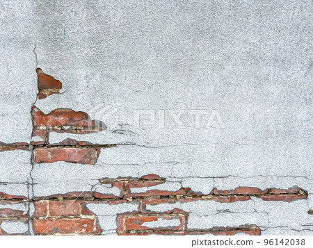 old peeling wall with exposed brick 96142038