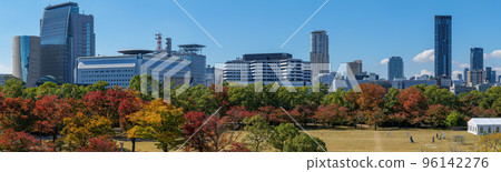 November 2, 2022 Autumn leaves of the Nishinomaru garden from the ruins of the sukiya-mae turret of Osaka Castle South side panorama 96142276