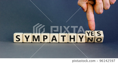 Sympathy yes or no symbol. Concept words Sympathy yes or Sympathy no on wooden cubes. Psychologist hand. Beautiful grey table grey background. Business sympathy yes or no concept. Copy space. Sympathy yes or no symbol. Concept words Sympathy yes or Sympathy no on wooden cubes. Psychologist hand. Beautiful grey table grey background. Business sympathy yes or no concept. Copy space. 96142597