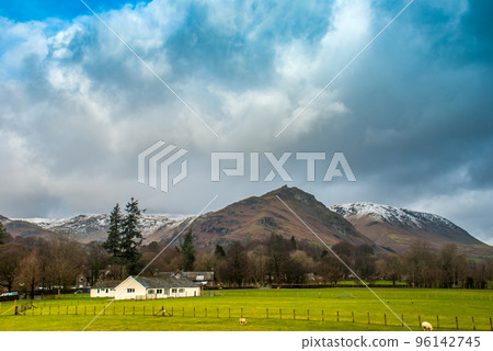 Sheep farm with a mountain backdrop. 96142745