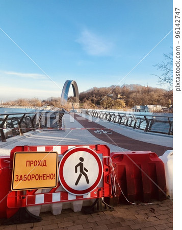 Pedestrian-bicycle bridge over Vladimirsky Spus Kyiv Ukraine November 9, 2022 renovation after Russian attack Pedestrian-bicycle bridge over Vladimirsky Spus Kyiv Ukraine November 9, 2022 renovation after Russian attack 96142747