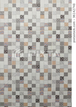 Beautiful patterned mosaic tiles laid on the bathroom wall. 96142748