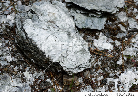 Macro photography of unprocessed pieces of mica minerals in a natural deposit. Macro photography of unprocessed pieces of mica minerals in a natural deposit. 96142932