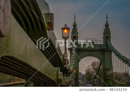The steel structure of the Hammersmith Bridge in the west side of London The first suspension bridge that crossed the River Thames from Hammersmith to Barnes 96143234