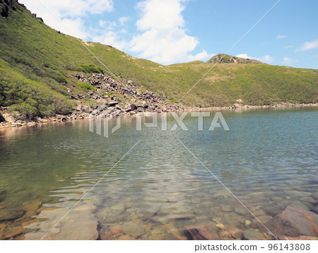 The Kuju mountain range in spring, nestled on the shores of Miike, Taketa City, Oita Prefecture The Kuju mountain range in spring, nestled on the shores of Miike, Taketa City, Oita Prefecture 96143808