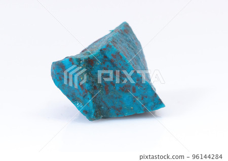Natural Chrysocolla stone on a white background. Mineral of blue and bluish-green color on a white background Natural Chrysocolla stone on a white background. Mineral of blue and bluish-green color on a white background 96144284