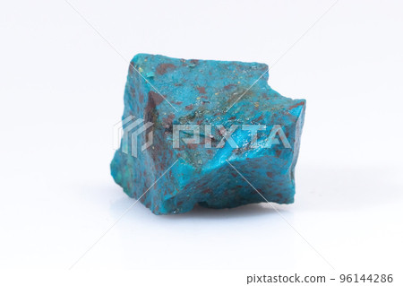 Natural Chrysocolla stone on a white background. Mineral of blue and bluish-green color on a white background Natural Chrysocolla stone on a white background. Mineral of blue and bluish-green color on a white background 96144286