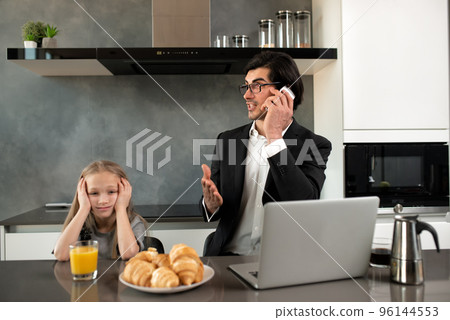 Unhappy daughter annoyed due to father work. 96144553
