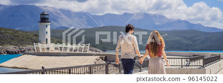 BANNER, LONG FORMAT Couple in love tourists enjoying the views of Architecture and luxury yachts in Lustica Bay, Montenegro. Travel around Montenegro concept. Go Everywhere BANNER, LONG FORMAT Couple in love tourists enjoying the views of Architecture and luxury yachts in Lustica Bay, Montenegro. Travel around Montenegro concept. Go Everywhere 96145022