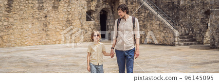 BANNER, LONG FORMAT Father and son tourists in Herceg Novi old town. Historical and touristic center of Herceg Novi. Montenegro 96145095
