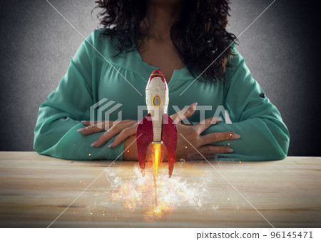 Businesswoman launches his company with a rocket. Concept of startup and innovation. 96145471