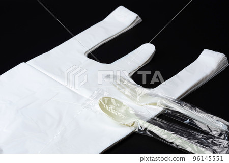 Plastic shopping bag, plastic spoon and plastic fork (image of disposable plastic products) Plastic shopping bag, plastic spoon and plastic fork (image of disposable plastic products) 96145551